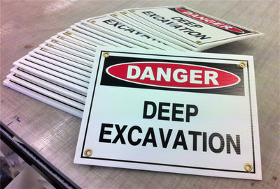 Corflute fence signs with eyelets. Easily attach danger and warning signs or temporary corflute notices