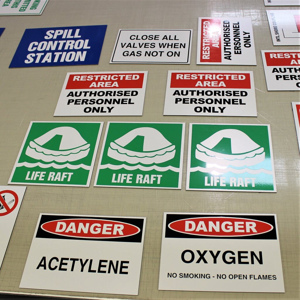 Safety signs for restricted areas and warnings, coloured vinyl on ACM 