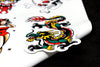 Colourful tatoo art dragon sticker with contoured cut out on peel-off backing