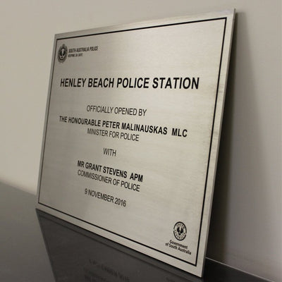 Brushed Aluminium laser engraved plaque with government logos